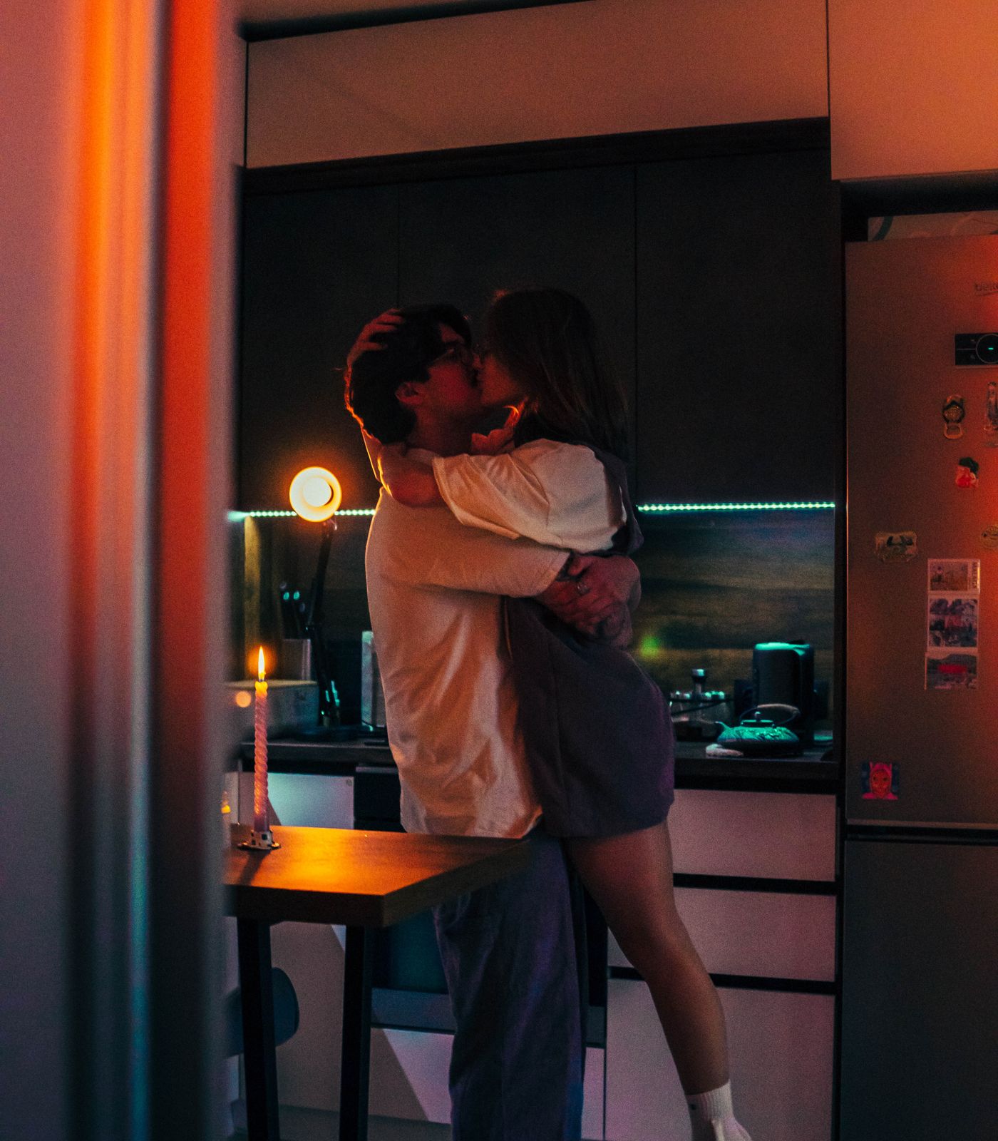 A couple reconnecting at home in the evening